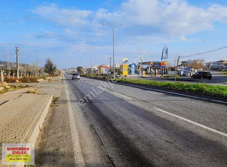 Mordoğan Emlaktan İzmir Caddesinde 7000m2 Satılık Köşe Tarla