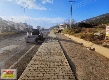 Mordoğan Emlaktan İzmir Caddesinde 2487m2 Satılık Köşe Tarla