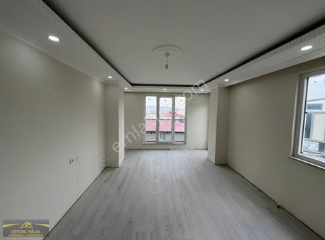 Ertürk Emlak'tan Atatürk Mah.'de Sıfır Asansörlü 2+1 Ara Kat