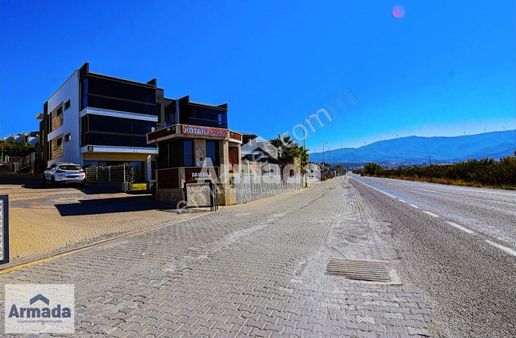 Kuşadası Soğucak'ta Deniz Manzaralı Güvenlikli Sitede 2+1 Daire
