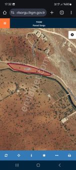 Bilge Emlaktan Tuğuluda Asvalt Üstü Satlık Arazi