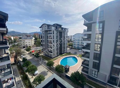 Pazarcı Mahallesinde Satılık Havuzlu 1+1 Daire