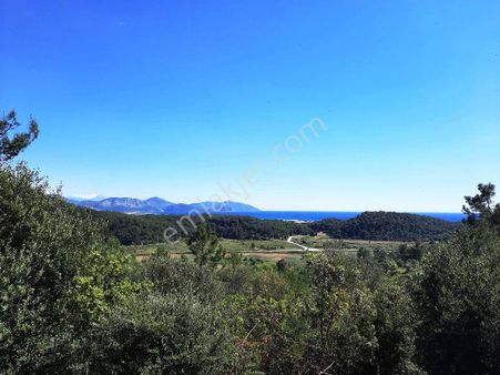 Mugla Sarıgermede Deniz Manzaralı 400 M2 İmarlı Arsa Satılık Veya Takas