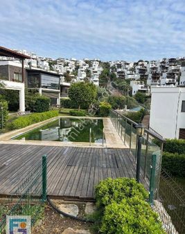 Gümüşlük De Satılık Eşyalı Bahçe Katı Daire.