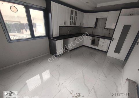 Turgutlu Satılık Ergenekon Mah 3+1 Oda 120m2 Otopark Üstü 1. Kat Doğalgazlı Balkonlu Sıfır Daire