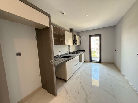 Kuşadası Otogar Arkası'nda Havuzlu Sitede 2+1 Sıfır Satılık Daire