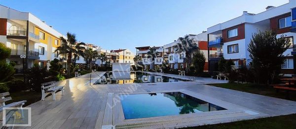 Lavınıa'dan Doğapark Evlerinde Takaslı Satılık 2+1 Daire