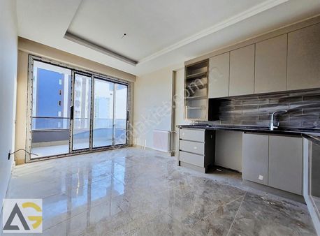 Auradan Mersin Tecede Satılık Lüks 2+1 Daire