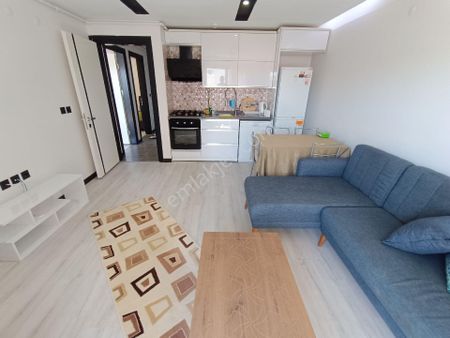 Seferihisar Merkezde 2+1 Arakat Asansörlü Eşyalı Satılık Daire