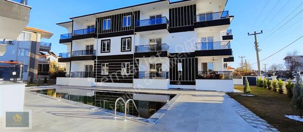 Lavınıa'dan Havuzlu Site İçinde 1+1 Satılık Daire