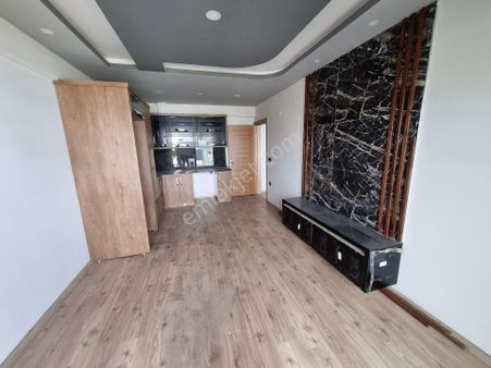 Kuşadası Davutlar'da Satılık Site İçerisinde Sıfır 2+1 Daire