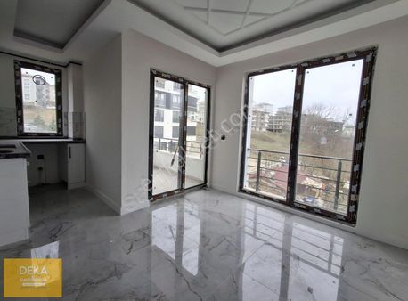 Deka Gayrimenkul'den Toplu Konut Bulvarına 50 Metre Satılık 1+1