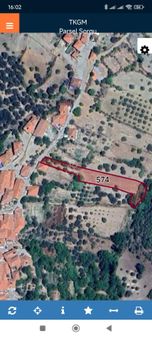 Manisa Akhisar Kömürcü Mh. Köy İçersinde Satılık 1838m2. Boş Tarla