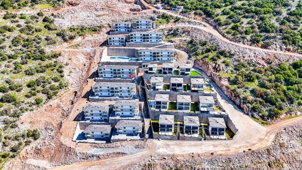 Didim Akbük’te Deniz Manzaralı Köşe Başı 2+1 Bahçe Katı Daire