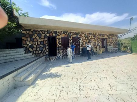 Mezitli Elvanlı Mahallesi'nde 2 Katlı Bina Havuzlu 1333 Metre Arsası Olan Yer Satılık