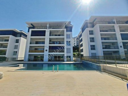 Kuşadasında Satılık 3+1 Havuzlu Güvenlikli Ayrı Mutfaklı Daire