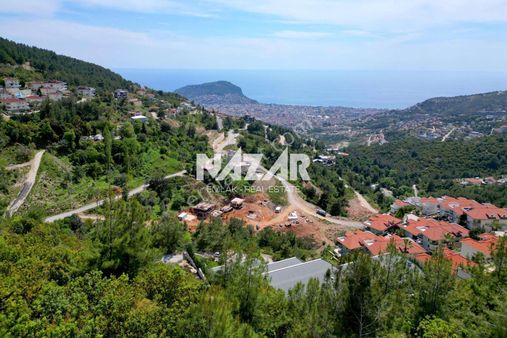 Alanya Tepe’de Satılık 1.075 M² Deniz Manzaralı İmarlı Arsa