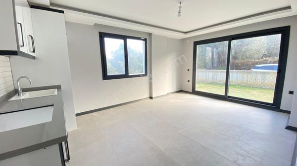 Kuşadası Güzelçamlı’da Satılık Geniş Bahçeli 2+1 Daire