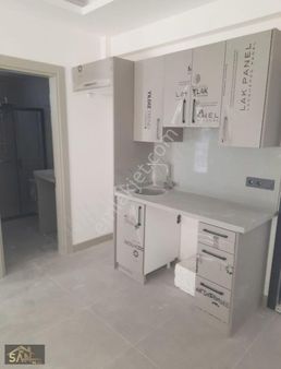 Urla Merkezde Satilik 1+1 Bahçeli Daire