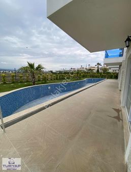 Turyap Sistem Kapızlı Marpessa Alaçatı'da Satılık 1+1 Bahçe Katı