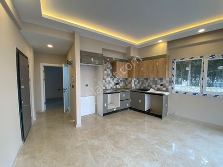 Aydın Kuşadası Güzelçamlı'da Satılık Müstakil Bahçeli 1+1 Yazlık Daire