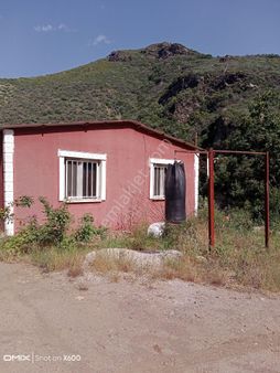 İzmir Bayındır Yakapinar Mahallesi'nde Müstakil Ev Ve 11.300 M² Zeytinlik Satılık