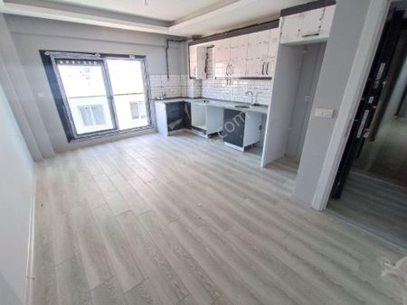 Buca Göçmen Mahallesi'nde 2+1 Asansörlü Arakat Sıfır Satılık Daire