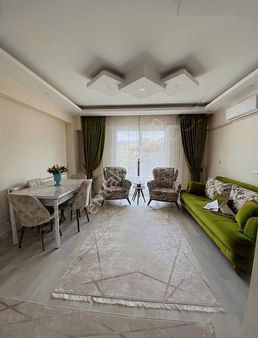 Defne Emlak'tan Menderes Mahallesinde Satılık Daire