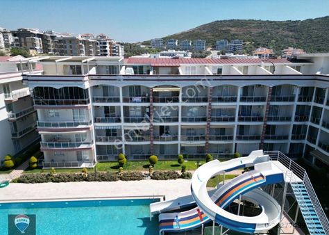 Satılık Kuşadası Eşin Park'ta Havuz Manzaralı 1+1 Arakat Daire...