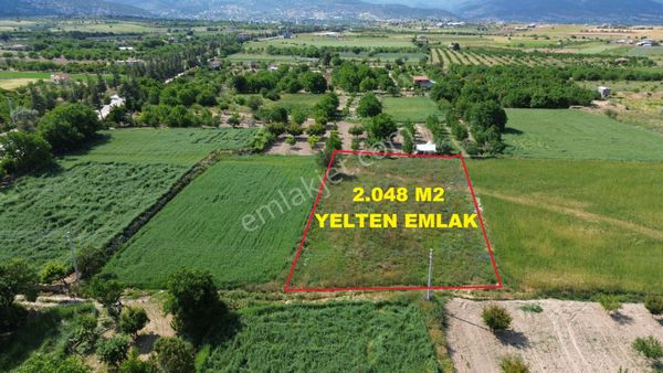 Korkuteli Yeltende Yol Kenarı Konumlu Beğenilen Sakin Bölgede Bahçe Yapımına Uygun Tarla İlandadır