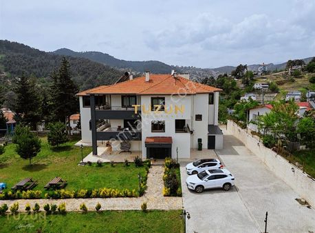 Tüzün'den Bekiralanı'nda Doğayla İç İçe 7+2 Satılık Malikane