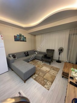 Kuşadası Davutlar Merkezde Havuzlu 1+1 Satılık Daire