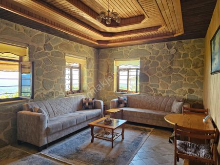 Burhaniye'de Doğanın Kalbinde Deniz Manzaralı Satılık Taş Ev