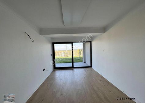 Ayvalık Sarımsaklı Da Satılık Harika Zemin Kat Daire.