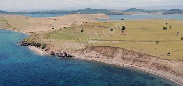 Balıkesir Ayvalık Cıplak Ada Da Satılık 29,548 Metre Kare Arsa.