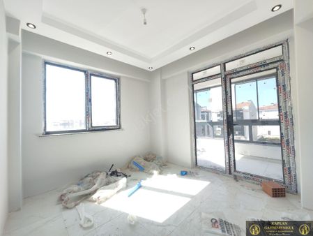 Kaplan Gayrimenkul’den 71 Evler Mah. Kafkas Cad. Üstü 2+0 60 M² Satılık Daire