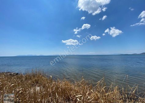 Balıkesir Ayvalık Sarımsaklı Da Satılık 7,200 Metre Kare Turizm İmarlı Arsa.denize Sıfır.