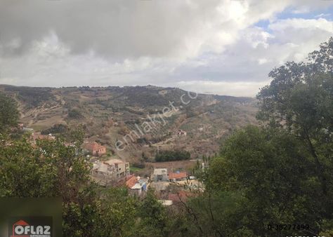 Oflaz Emlak'tan Yayladağı Kulaçta 7dönüm Köy İçi Tek Tapu Tarla