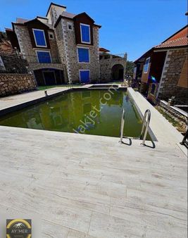 Yeni Foça Da Deniz Manzaralı Teraslı Satılık Taş Villa