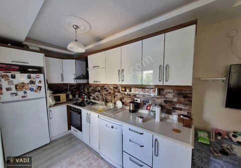 Kuşadası Davutlar'da Satılık Bahçeli 1+1 Daire