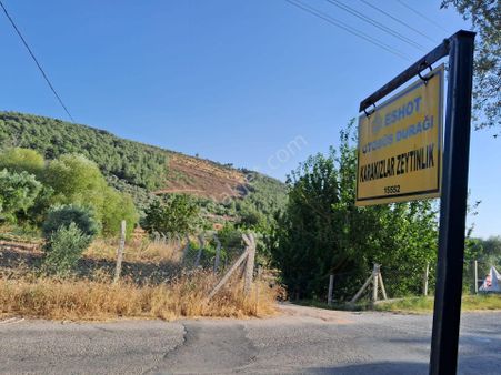 Acill Torbalı Karakızlarda 308m2 Elektrık Suyu Mevcut Tarla Otobüs Durağı Dibinde