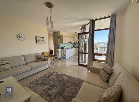 Gümüşlük'te Merkezi Konumda Havuzlu Sitede 2+1 Üst Kat