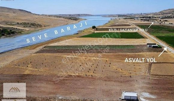 5.911 M2 Asvalt Yol Üzeri Baraj Bitişiği Bağ Evlik Sulu Tarla