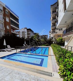 Konyaaltı Hurma'da 2+1 Doğalgaz Kombili Eşyalı, Lüks Yüzme Havuzlu Satılık Daire