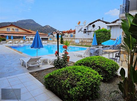 Ovacık' Ta Satılık Havuzlu Eşyalı Stüdyo Daire