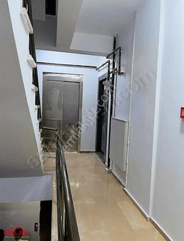 Evgör Emlak'dan Merkezde Otoparklı Sıfır Ara Kat Daire