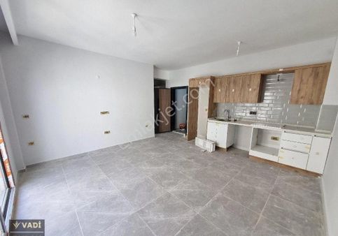 Kuşadası Davutlar'da Satılık Sıfır Arakat 1+1 Daire