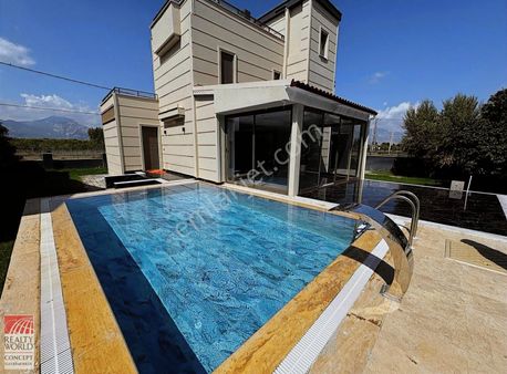 Satılık Döşemealtı Yalınlı Havuzlu Müstakil 4+1 Villa......