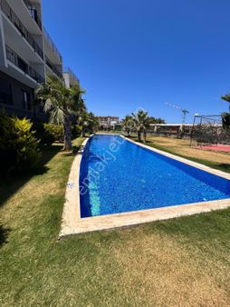 Çeşme Dalyan’da Deniz Manzaralı, Kış Bahçeli Bahçe Dubleks Daire!