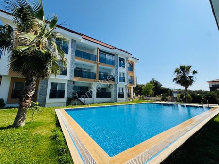 Kuşadası Davutlar’da Havuzlu Sitede Otoparklı Satılık 2+1 Yazlık Daire